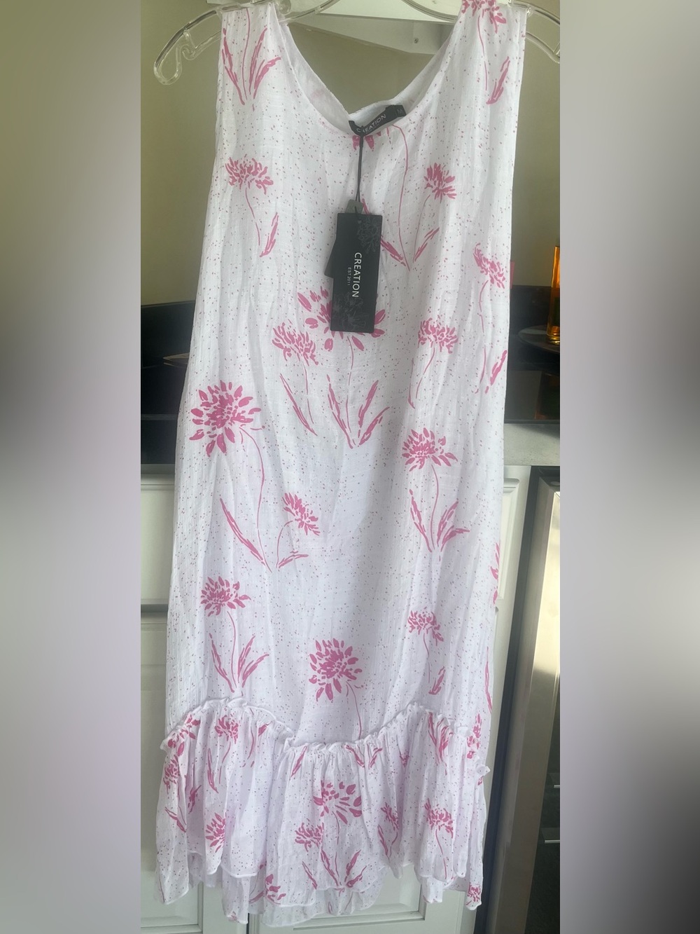 White Sleeveless Dress with Pink Floral Print. Brand new size Medium
